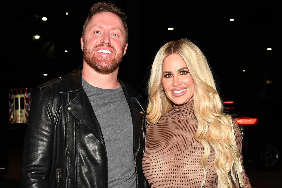 <p>Paras Griffin/GC </p> Kroy Biermann and Kim Zolciak-Biermann are seen arriving outside the Post Malone concert at State Farm Arena on October 18, 2022 