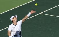 2016 Rio Olympics - Tennis - Semifinal - Men's Singles Semifinals - Olympic Tennis Centre - Rio de Janeiro, Brazil - 13/08/2016. Andy Murray (GBR) of Britain serves against Kei Nishikori (JPN) of Japan. REUTERS/Kevin Lamarque