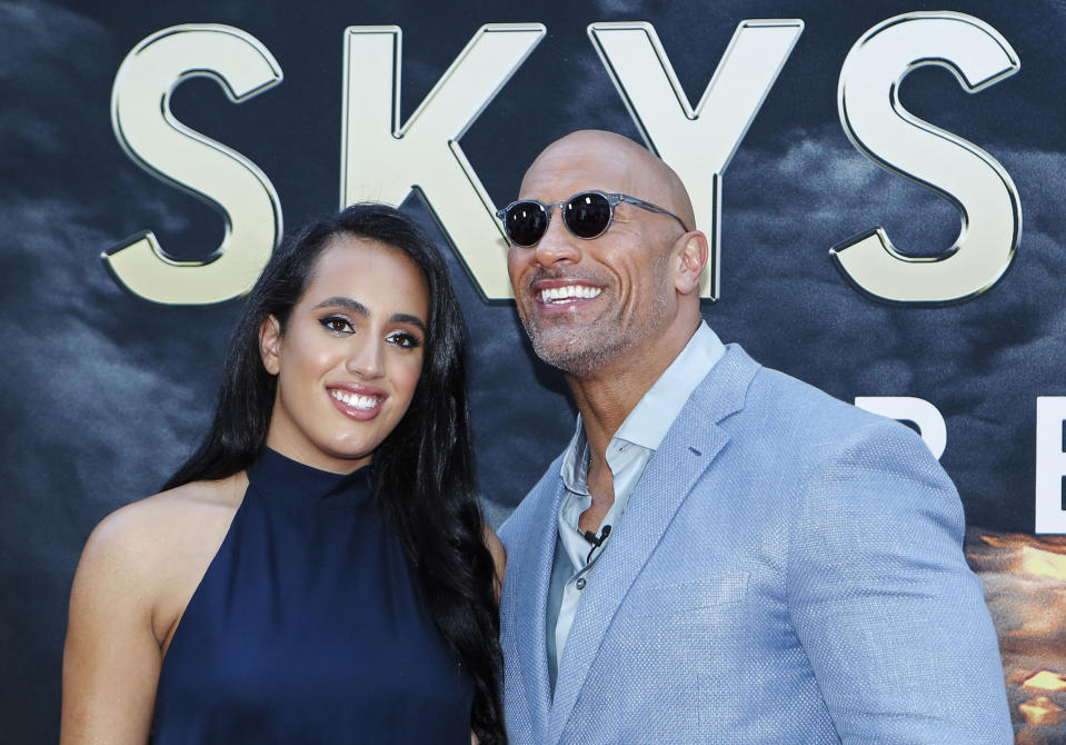 Simone Alexandra Johnson, pictured with her father Dwayne Johnson, joined the WWE. (Photo: KENA BETANCUR/AFP via Getty Images)