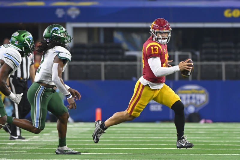 USC quarterback Caleb Williams (R) remains the favorite to be the No. 1 overall pick in the 2024 NFL Draft. File Photo by Ian Halperin/UPI