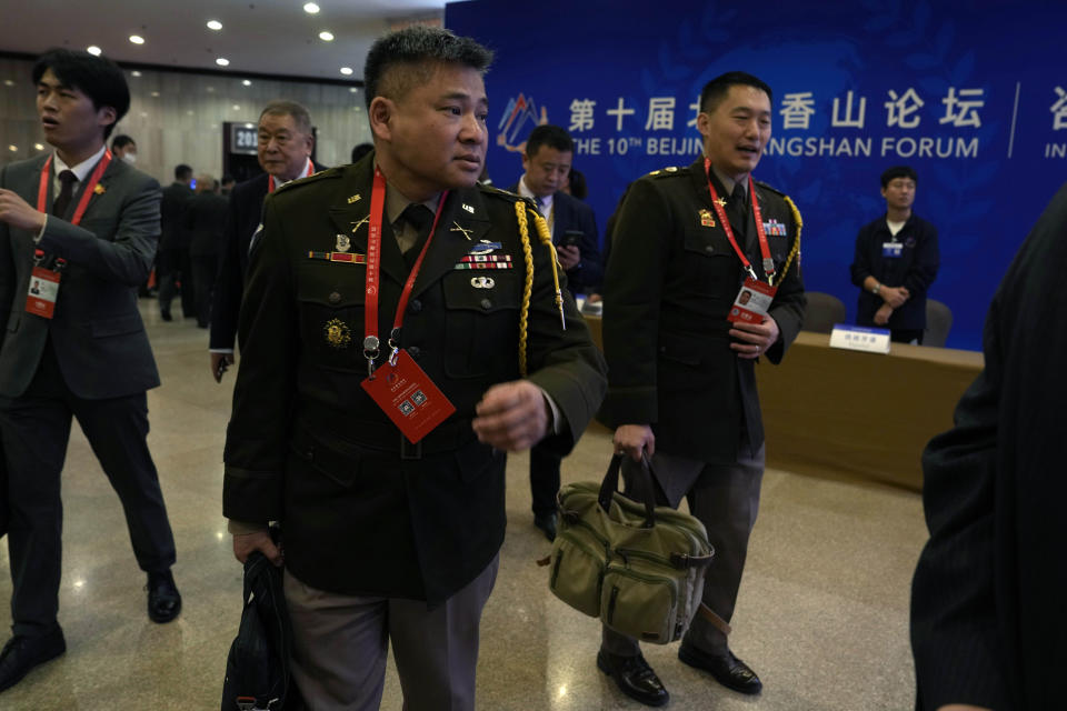 U.S. military officers attend the 10th Beijing Xiangshan Forum held in Beijing, Monday, Oct. 30, 2023. China suspended military communication with the U.S. in August 2022 to show its displeasure over a visit by former U.S. House Speaker Nancy Pelosi to self-ruled Taiwan, which Beijing considers part of its territory. (AP Photo/Ng Han Guan)