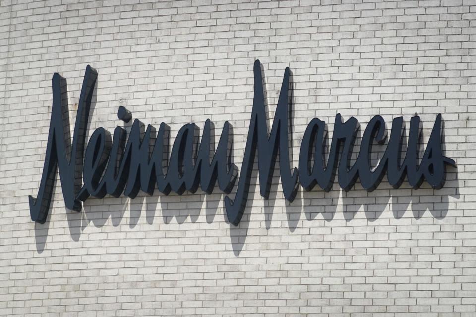 A sign hangs outside of a Neiman Marcus store that has been shuttered by the COVID-19 pandemic at Oak Brook Center shopping mall on May 07, 2020 in Oak Brook, Illinois. (Photo by Scott Olson/Getty Images)