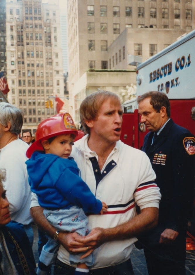 Brian with his father at Fire Prevention Day at Rockefeller Center when Brian was 2.