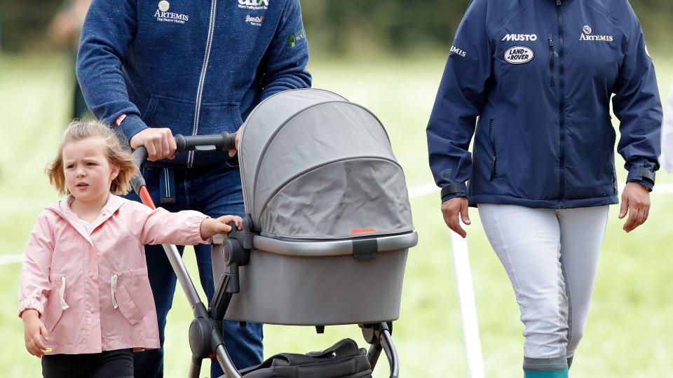 STROUD, UNITED KINGDOM - SEPTEMBER 09: (EMBARGOED FOR PUBLICATION IN UK NEWSPAPERS UNTIL 24 HOURS AFTER CREATE DATE AND TIME) Mike Tindall and Zara Tindall with their daughters Mia Tindall and Lena Tindall (in her pram) attend day 3 of the Whatley Manor Horse Trials at Gatcombe Park on September 9, 2018 in Stroud, England. (Photo by Max Mumby/Indigo/Getty Images)