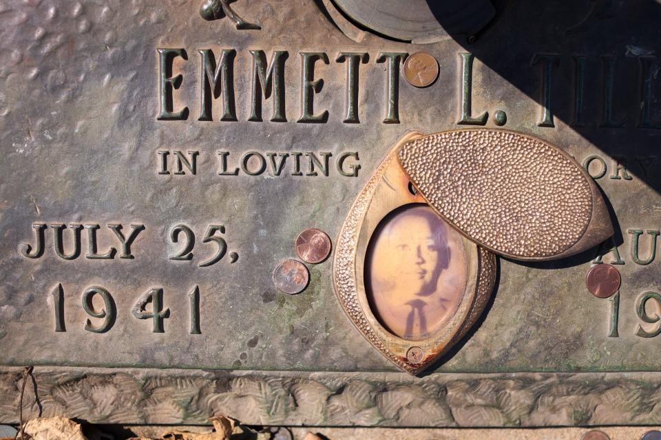 A faded photograph is attached to the  headstone that marks the gravesite of Emmett Till in Burr Oak Cemetery on March 22, 2021 in Chicago, Illinois. Till's brutal murder in Money, Mississippi in the summer of 1955 and his mother's decision to hold an open-casket funeral to expose the brutality of the murder is credited with igniting the modern civil rights movement. The home in Chicago where Till lived with his mother recently gained Chicago landmark status and there are plans to turn the home into a museum and the church where his funeral was held is being considered for designation as a National Monument.