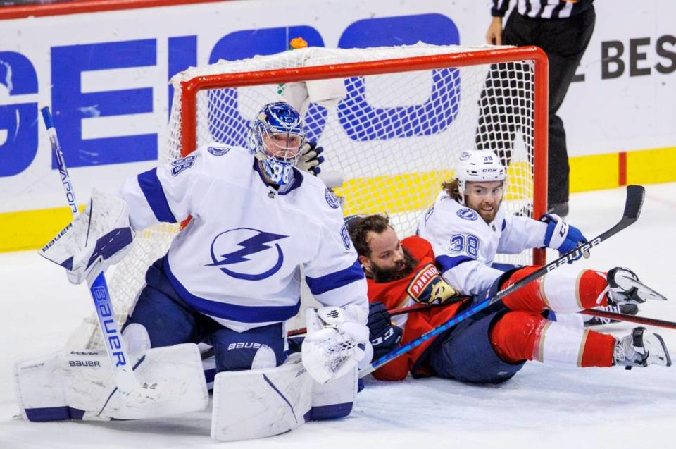 Tampa Bay Lightning goaltender Andrei Vasilevskiy (88) defends the goal as defenseman Ryan McDonagh (27) and left wing Brandon Hagel (38) collide with Florida Panthers defenseman Radko Gudas (7) during the third period of Game 2 of a second round NHL Stanley Cup series at FLA Live Arena on Thursday, May 19, 2022 in Sunrise, Fl.