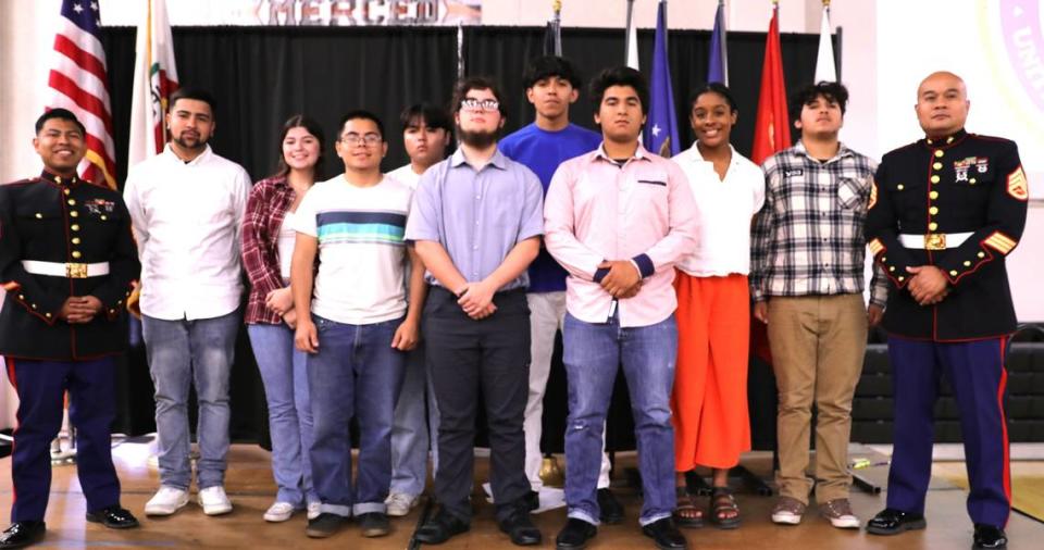 Merced Union High School District students who are enlisted in the Marines pose for photos during a luncheon honoring the 50 students in the district who are joining military service branches after graduation on Tuesday, May 21, 2024 at Merced High School.