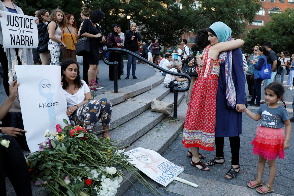 Attendees leave flowers in New York City.