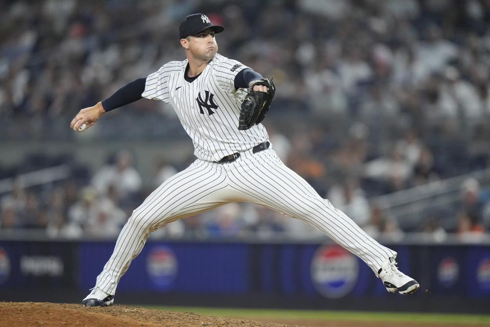 New York Yankees' Clay Holmes pitches during the ninth inning of a baseball game against the Boston Red Sox, Friday, July 5, 2024, in New York. (AP Photo/Frank Franklin II)