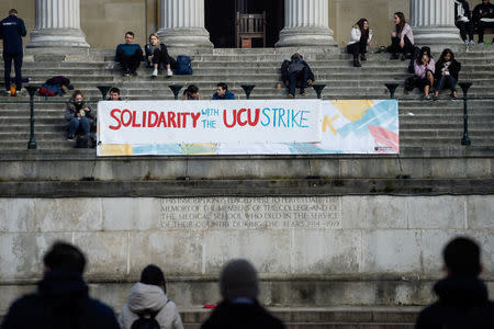 A banner supporting lecturer strikes is displayed outside the University College of London, Britain February 22, 2018. REUTERS/Peter Summers