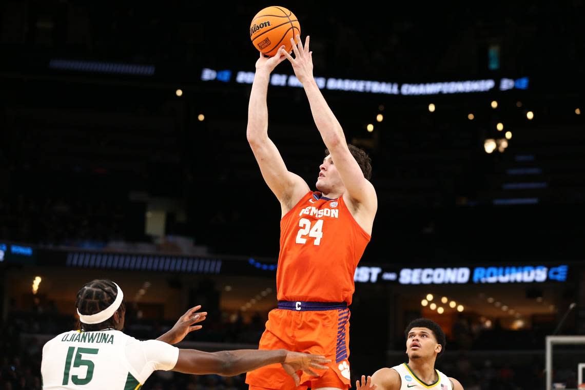 Mar 24, 2024; Memphis, TN, USA; Clemson Tigers center PJ Hall (24) shoots against Baylor Bears forward Josh Ojianwuna (15) in the first half in the second round of the 2024 NCAA Tournament at FedExForum. Mandatory Credit: Petre Thomas-USA TODAY Sports