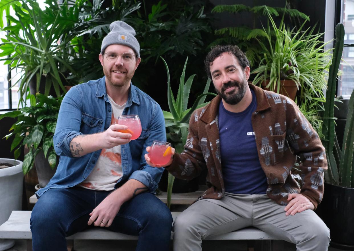 Josh Gandee, left, bartender and host of the podcast "no proof," and Collin Castore, co-owner of Seventh Son Brewing, have teamed up to launch three new non-alcoholic beverages during "A Night to Remember" at Seventh Son’s sister brewery, Getaway, on Monday evening.