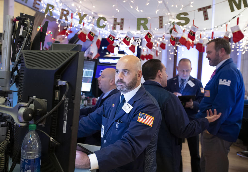 NEW YORK, Dec. 13, 2019 -- Traders work at the New York Stock Exchange in New York, the United States, on Dec. 13, 2019. U.S. stocks ended higher on Friday as investors digested updates about U.S.-China trade and a slew of economic data. The Dow Jones Industrial Average rose 3.33 points, or 0.01 percent, to 28,135.38. The S&P 500 rose 0.23 points, or 0.01 percent, to 3,168.80. The Nasdaq Composite Index was up 17.56 points, or 0.20 percent, to 8,734.88. (Photo by Wang Ying/Xinhua via Getty) (Xinhua/Wang Ying via Getty Images)