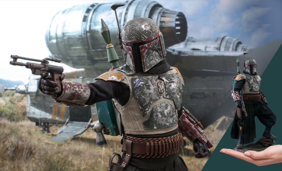 An action figure of Boba Fett in his armor in front of his ship, with the figure being held in a hand to the right side for scale.