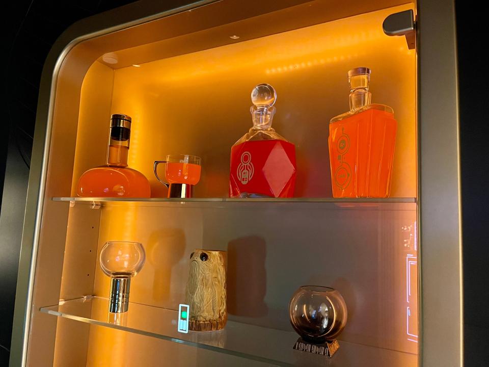 display of drink makings at the entrance to hyperspace lounge on disney wish cruise