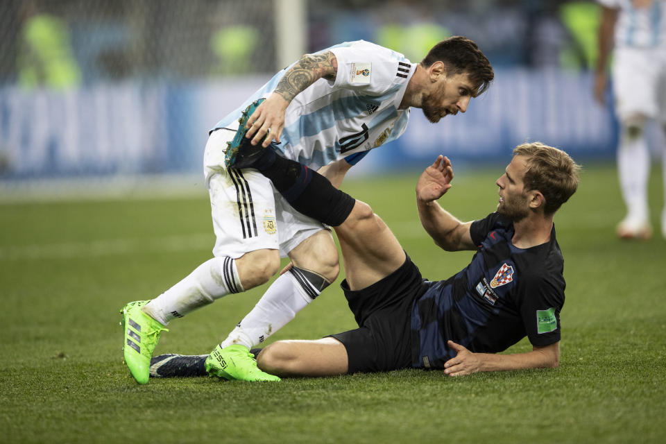 Boiling over: Even Lionel Messi was drawn into the ill-feeling as he clashed with Croatia during the feisty first half. (Getty)