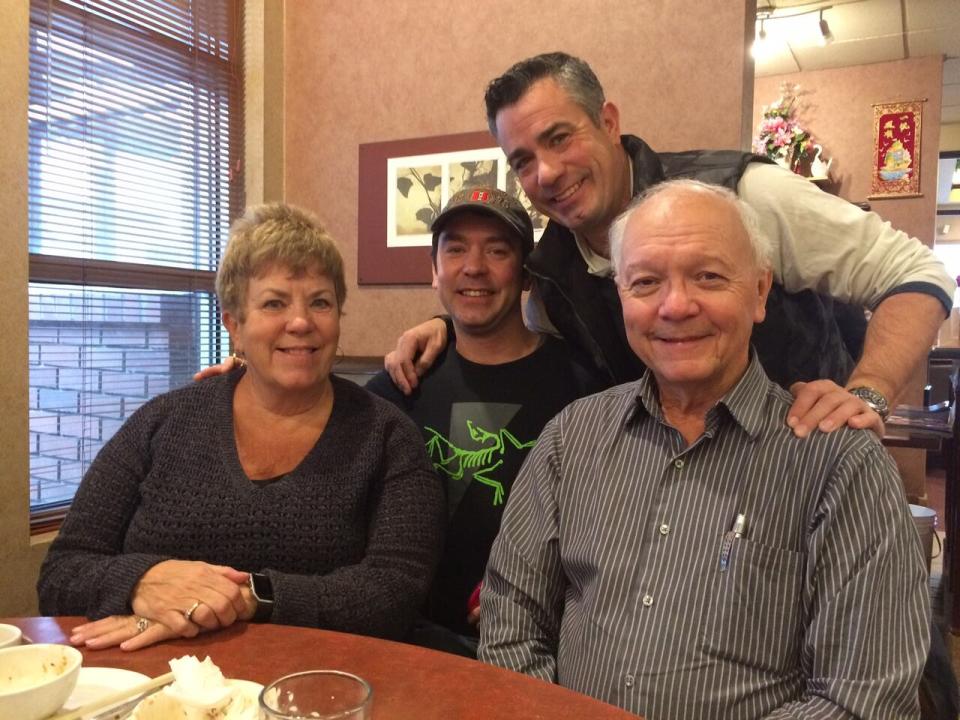 Kevin McGowan (wearing hat) with his parents and brother in January 2018. McGowan was killed in Dawson City, Yukon, in May 2018.