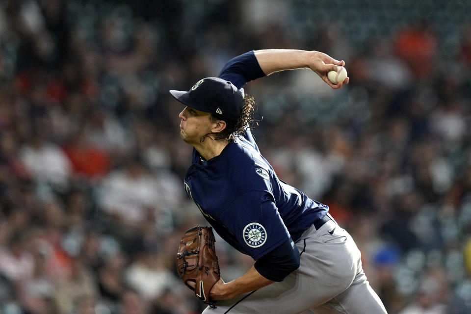 Seattle Mariners starting pitcher Logan Gilbert throws during the third inning of a baseball game against the Houston Astros Wednesday, June 8, 2022, in Houston. (AP Photo/David J. Phillip)