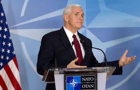 U.S. Vice President Mike Pence briefs the media during a meeting with NATO Secretary-General Jens Stoltenberg at the Alliance headquarters in Brussels, Belgium, February 20, 2017. REUTERS/Virginia Mayo