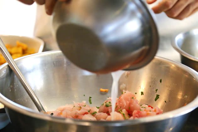 Leaving seafood for too long in an acidic marinade will essentially cook it, turning it into ceviche. (Photo: Elizabeth Beard via Getty Images)