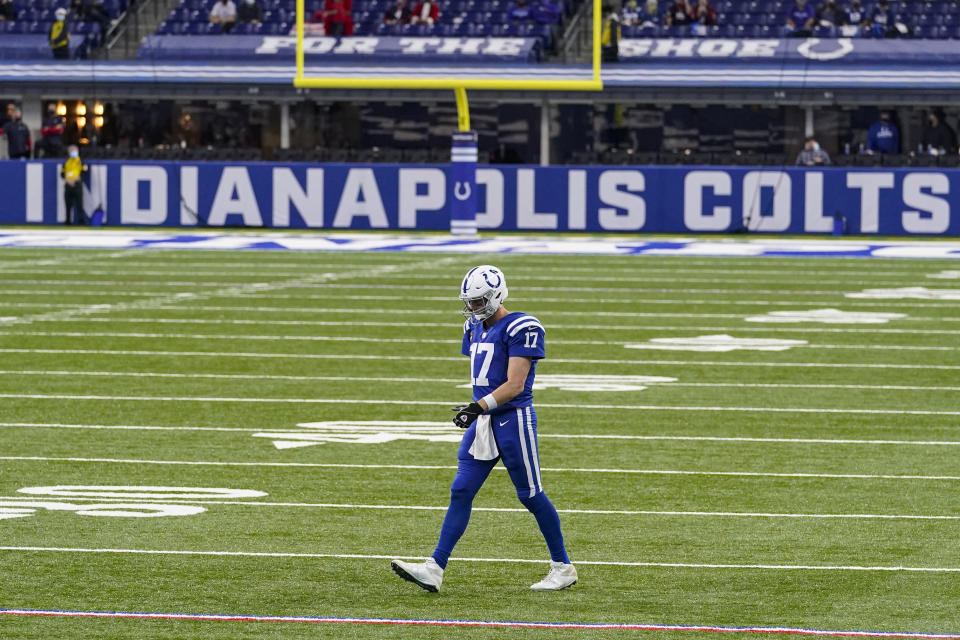 FILE - Indianapolis Colts quarterback Philip Rivers (17) walks back to the huddle after a time out in the second half of an NFL football game against the Houston Texans in Indianapolis, in this Sunday, Dec. 20, 2020, file photo. On Wednesday, Jan. 20, 2021, the 39-year-old Indianapolis Colts quarterback announced his retirement. (AP Photo/Darron Cummings, FIle)