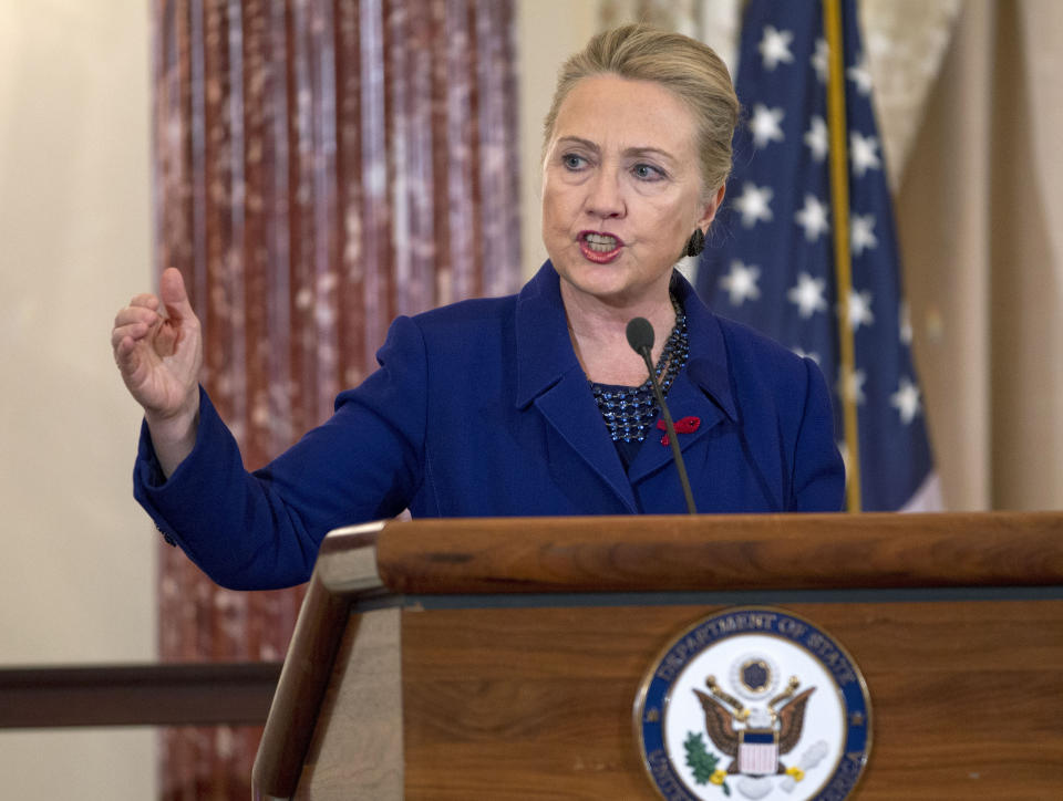 Secretary of State Hillary Rodham Clinton gestures as she speaks during a ceremony in recognition of World AIDS Day, Thursday, Nov. 29, 2012, at the State Department in Washington, where she released The U.S. President's Emergency Plan for AIDS Relief, (PEPFAR) Blueprint' for Creating an AIDS- Free Generation.