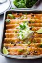 <p>Say hello to your new favorite one-pot dinner.</p><p>Get the recipe from <a href="https://diethood.com/ground-turkey-black-bean-enchiladas/" rel="nofollow noopener" target="_blank" data-ylk="slk:Diethood;elm:context_link;itc:0;sec:content-canvas" class="link ">Diethood</a>.</p>