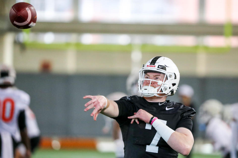 OSU quarterback Alan Bowman throws a pass during practice on March 21 in Stillwater. The former Texas Tech starter could be among three quarterbacks to play for the Cowboys in Saturday's season opener.