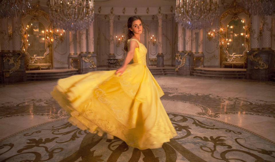 Belle wearing the iconic yellow ballgown