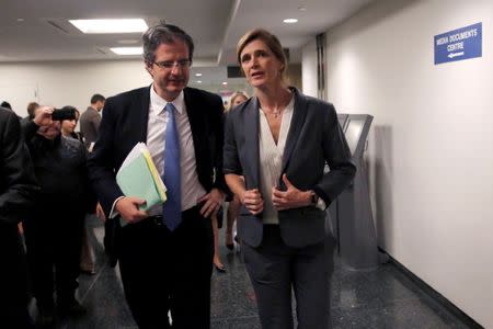 (L-R) Permanent Representative of France to the United Nations Francois Delattre and United States Ambassador to the United Nations Samantha Power exit following the postponement of an United Nations Security Council vote, aimed at ensuring that U.N. officials can monitor evacuations from besieged parts of the Syrian city of Aleppo, at the United Nations in Manhattan, New York City, U.S., December 18, 2016. REUTERS/Andrew Kelly