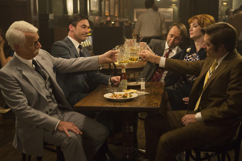 John Slattery as Roger Sterling, Jon Hamm as Don Draper, Vincent Kartheiser as Pete Campbell, Christina Hendricks as Joan Harris and Kevin Rahm as Ted Chaough in Mad Men. | Justina Mintz—AMC Networks