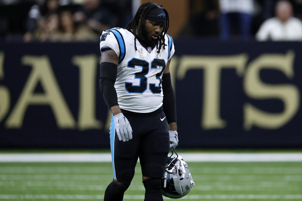 NEW ORLEANS, LOUISIANA - JANUARY 08: D&#39;Onta Foreman #33 of the Carolina Panthers reacts after being disqualified during the third quarter against the New Orleans Saints at Caesars Superdome on January 08, 2023 in New Orleans, Louisiana. (Photo by Chris Graythen/Getty Images)