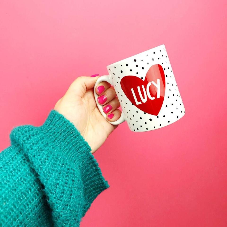 <p>This pretty personalised mug is bound to help wake you up in the morning. </p><p><strong><strong><strong>Not On The High Street</strong></strong></strong>, <strong>£16.50</strong></p><p><a class="link " href="https://go.redirectingat.com?id=127X1599956&url=https%3A%2F%2Fwww.notonthehighstreet.com%2Felsieandnell%2Fproduct%2Fpersonalised-heart-mug&sref=https%3A%2F%2Fwww.delish.com%2Fuk%2Fkitchen-accessories%2Fg29229984%2Fpersonalised-mugs%2F" rel="nofollow noopener" target="_blank" data-ylk="slk:BUY NOW;elm:context_link;itc:0;sec:content-canvas">BUY NOW</a> </p>