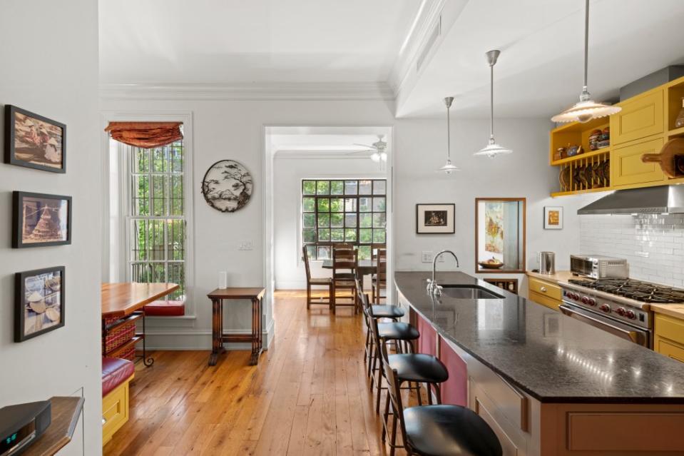 Casement windows overlook an enchanting garden. Richard Caplan