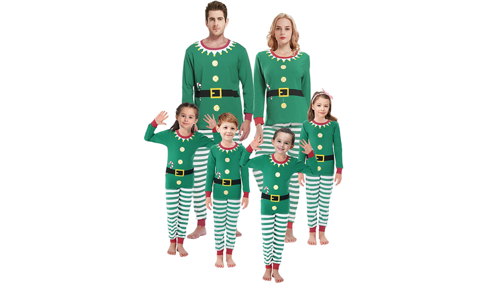 Family of six in matching elf pajamas