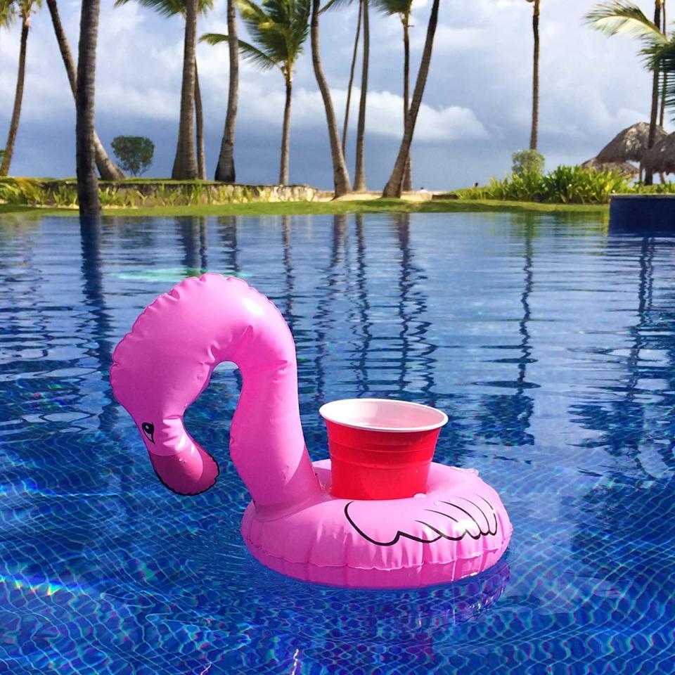 Have happy hour while you're chillin' in the pool with this fun beverage holder that won't spill or tip over. <br /><br /><strong>Promising review:</strong> "I love these! They work great, no tipping issues at all. <strong>These little guys just float around the pool on their own like an inflatable bartender.</strong> I found cups and cans fit perfectly snug (even with a Koozie). I leave my Koozie on my bottles for a secure fit and have never had a problem." &mdash; <a href="https://amzn.to/2QKEZgS" target="_blank" rel="nofollow noopener noreferrer" data-skimlinks-tracking="5580838" data-vars-affiliate="Amazon" data-vars-href="https://www.amazon.com/gp/customer-reviews/R1QSBLGOH5UQB6?tag=bfgenevieve-20&amp;ascsubtag=5580838%2C4%2C33%2Cmobile_web%2C0%2C0%2C1159984" data-vars-keywords="cleaning,fast fashion" data-vars-link-id="1159984" data-vars-price="" data-vars-product-id="16176708" data-vars-retailers="Amazon">Amazon Customer</a><br /><br /><strong>Get a set of three from Amazon for <a href="https://amzn.to/3enGPwd" target="_blank" rel="nofollow noopener noreferrer" data-skimlinks-tracking="5580838" data-vars-affiliate="Amazon" data-vars-asin="B06XX518TR" data-vars-href="https://www.amazon.com/dp/B06XX518TR?tag=bfgenevieve-20&amp;ascsubtag=5580838%2C4%2C33%2Cmobile_web%2C0%2C0%2C1159955" data-vars-keywords="cleaning,fast fashion" data-vars-link-id="1159955" data-vars-price="" data-vars-product-id="7967705" data-vars-product-img="https://m.media-amazon.com/images/I/41NtcWRCxDL.jpg" data-vars-product-title="GoFloats Inflatable Pool Drink Holders (3 Pack) Designed in the US | Huge Selection from Unicorn, Flamingo, Palm and More | Float Your Hot Tub Drinks In Style, Cheeseburger" data-vars-retailers="Amazon">$13.22+</a> (available in 16 other designs).</strong>