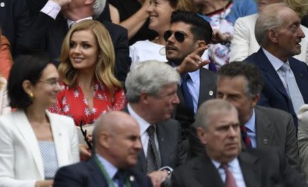 Britain Tennis - Wimbledon - All England Lawn Tennis & Croquet Club, Wimbledon, England - 8/7/16 Singer Katherine Jenkins with Andrew Jonathan Levitas and Actor Charles Dance (R) in the royal box on centre court during Switzerland's Roger Federer's match against Canada's Milos Raonic REUTERS/Tony O'Brien