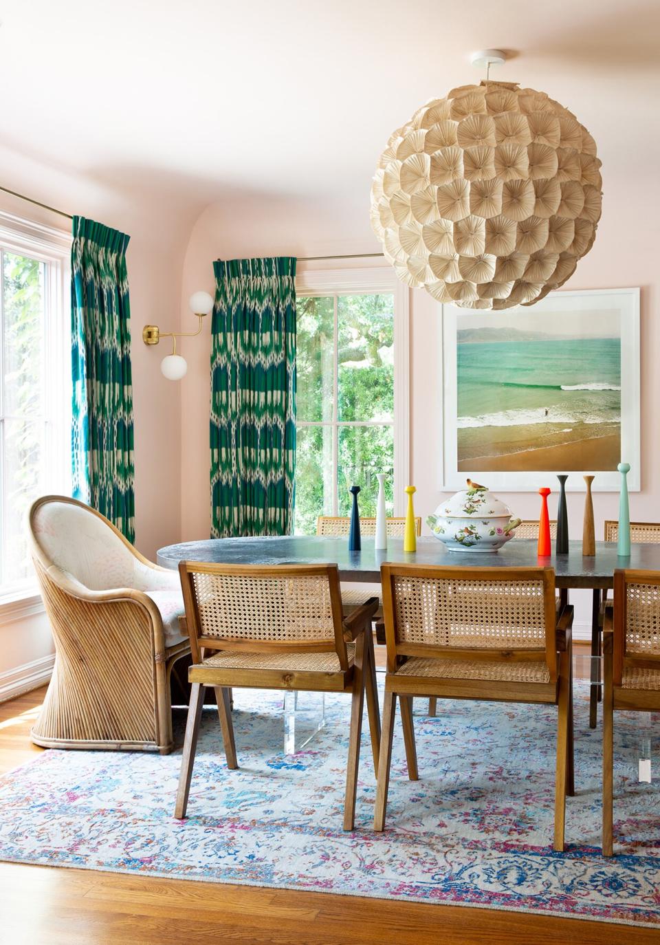 houston dining room with wicker chairs and peach walls