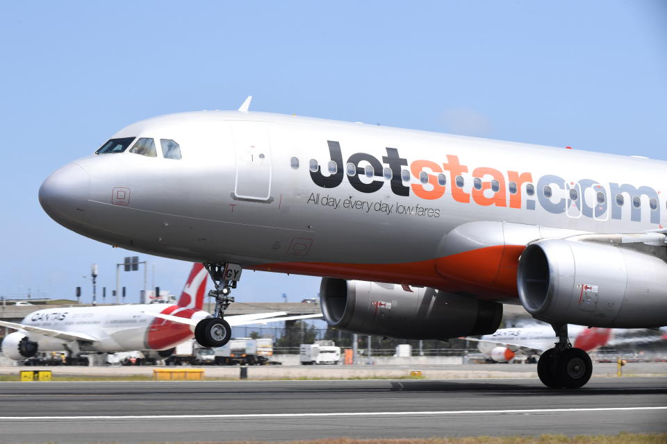 A Jetstar aircraft lands at Sydney Airport on November 09, 2021 in Sydney, Australia.