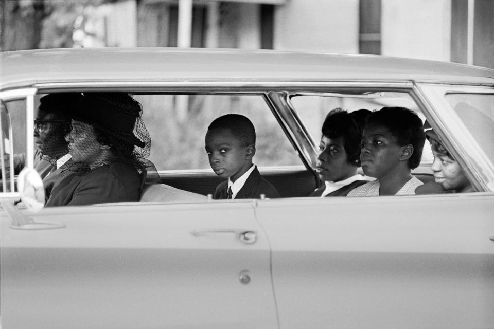 Ben Chaney, center, in the car on the way to his brother's funeral in August 1964 in Mississippi.