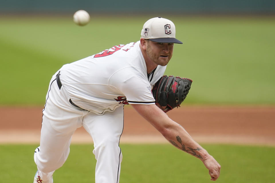 Cleveland Guardians' Ben Lively pitches in the first inning of a baseball game against the Chicago White Sox, Thursday, July 4, 2024, in Cleveland. (AP Photo/Sue Ogrocki)