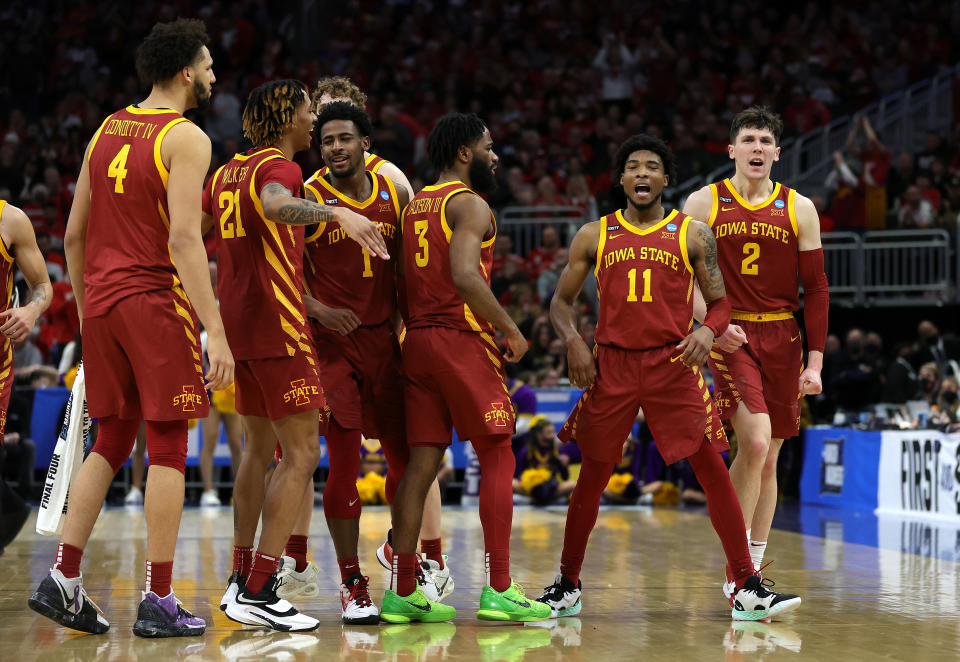 MILWAUKEE, WISCONSIN - MARCH 18: Tyrese Hunter #11 of the Iowa State Cyclones reacts after a three point basket against the LSU Tigers in the second half during the first round of the 2022 NCAA Men's Basketball Tournament at Fiserv Forum on March 18, 2022 in Milwaukee, Wisconsin. (Photo by Stacy Revere/Getty Images)