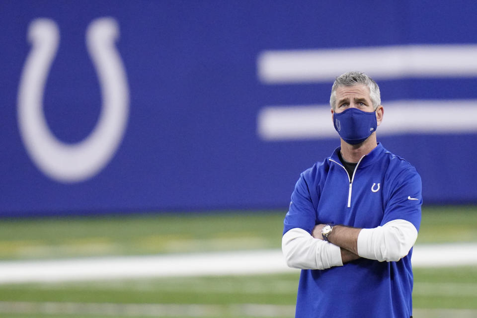 Indianapolis Colts head coach Frank Reich watches as the Colts warm up before an NFL football game against the Jacksonville Jaguars, Sunday, Jan. 3, 2021, in Indianapolis. (AP Photo/AJ Mast)