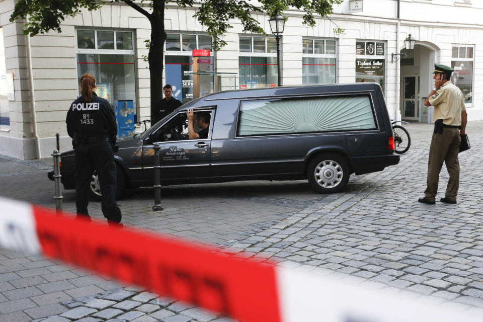 <p>A hearse leaves the area after an explosion in Ansbach, Germany, Monday, July 25, 2016. (AP Photo/Matthias Schrader)</p>