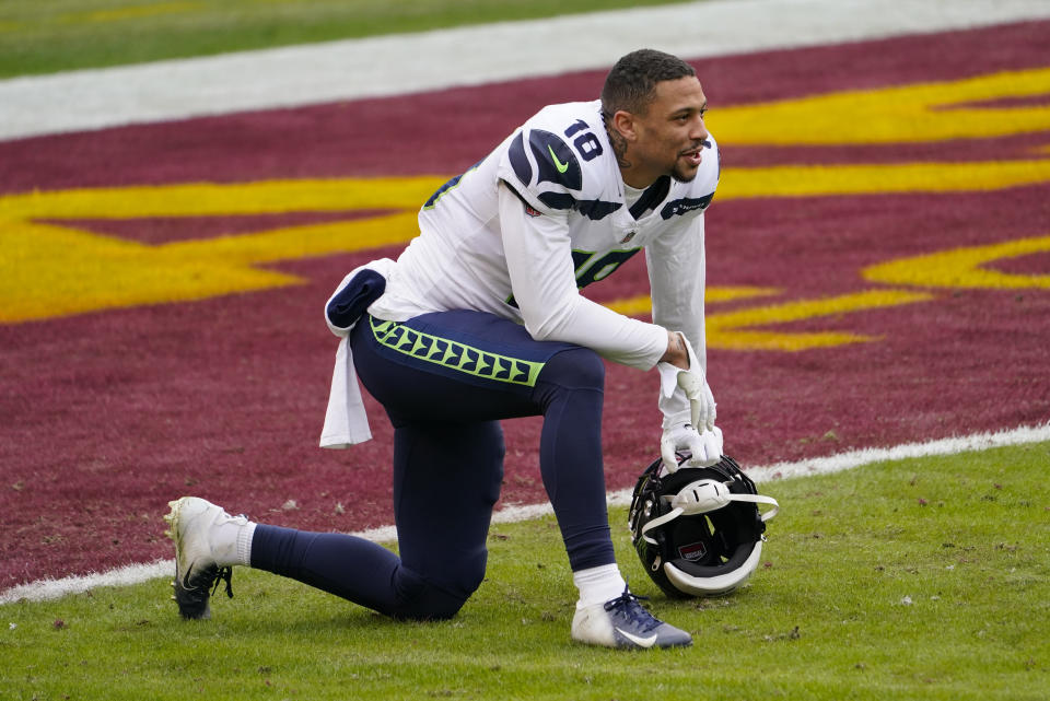Seattle Seahawks wide receiver Freddie Swain (18) on the field before the start of an NFL football game against the Washington Football Team, Sunday, Dec. 20, 2020, in Landover, Md. (AP Photo/Andrew Harnik)