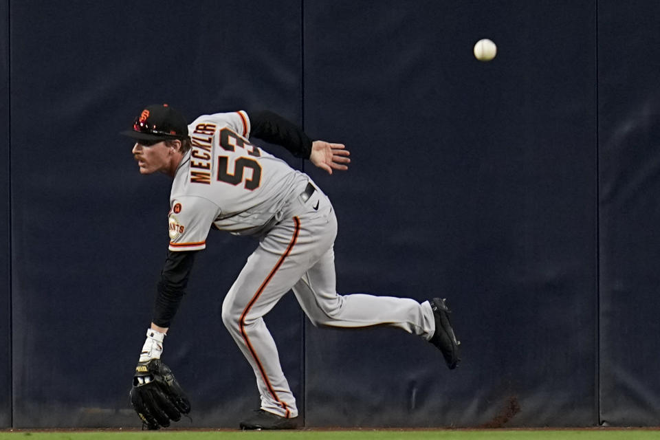 San Francisco Giants center fielder Wade Meckler can't make the catch on an RBI single hit by San Diego Padres' Luis Campusano during the third inning of a baseball game Friday, Sept. 1, 2023, in San Diego. (AP Photo/Gregory Bull)