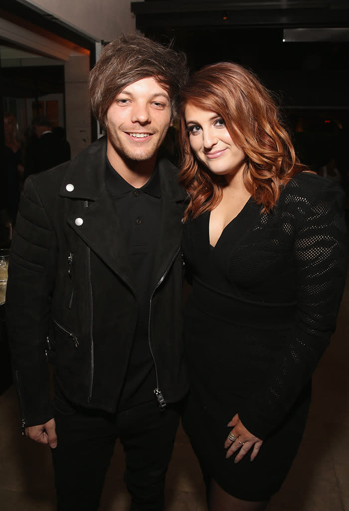 New dad and One Direction singer Louis Tomlinson made sure to get a pic with the lady of the hour, Miss Best New Artist Meghan Trainor, at the Sony party. (Getty Images)