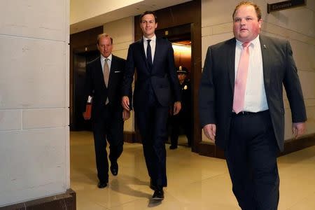 White House senior advisor Jared Kushner (C), accompanied by his attorney Abbe Lowell (L), arrives for a closed House Intelligence Committee meeting on Capitol Hill in Washington, U.S. July 25, 2017. REUTERS/Jonathan Ernst