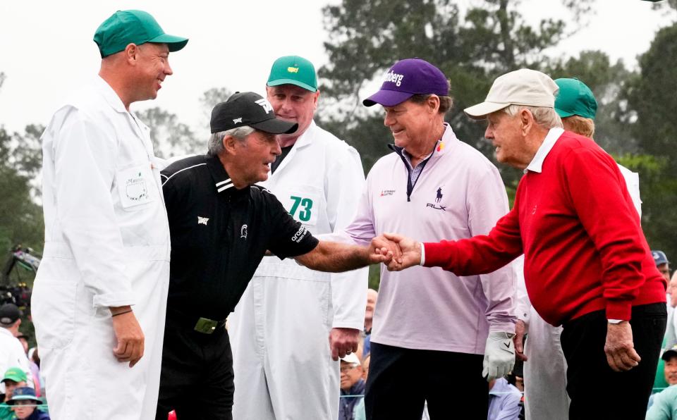 Honorary starters Gary Player, Tom Watson and Jack Nicklaus shake hands on the first tee after teeing off during the first round of The Masters golf tournament at the Augusta National Golf Club in Augusta, G.a, on April 6, 2023. Pga Masters Tournament First Round