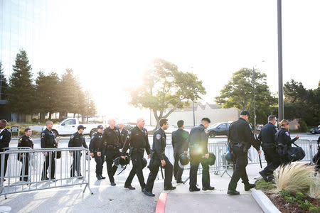 Police officers arrive at the Hyatt Regency San Francisco Airport hotel before the California Republican Convention in Burlingame, California, U.S., April 29, 2016. REUTERS/Stephen Lam